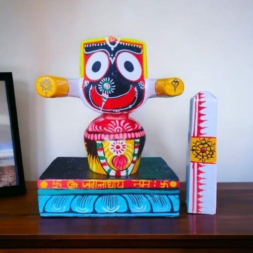 15 cm Patitopaban Jagannath Murti. Hand-carved from neem wood, this single idol represents Lord Jagannath as the savior of the fallen.