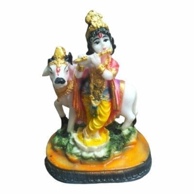 Hand-carved white marble murti of Lord Krishna, a Hindu deity known for love and compassion.