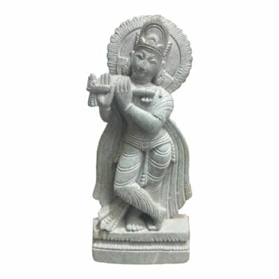 Stone Murti of Lord Krishna. Hand-carved from stone, this idol captures the divine essence of Lord Krishna.