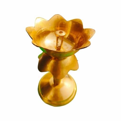 Handcrafted brass Lotus Diya with an elegant design, perfect for illuminating your puja space.