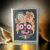 Jagannath Mahaprabhu photo frame displayed in a home, bringing blessings and a sacred atmosphere.