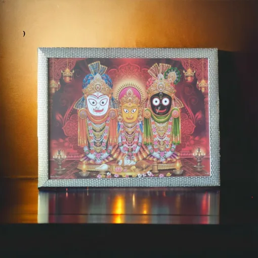 Jagannath and siblings photo frame placed on a puja altar, enhancing the sacred space and inviting blessings.