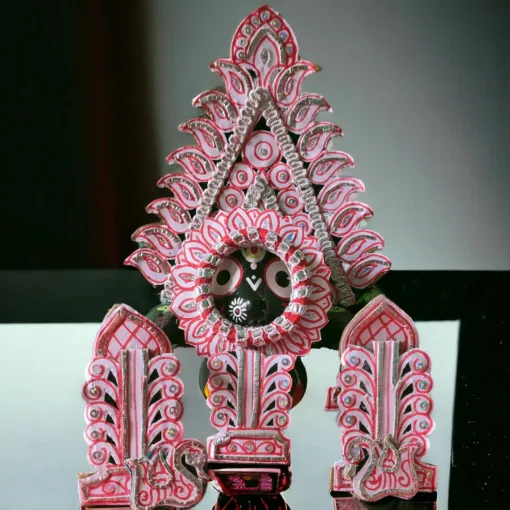 Padma Besha on Jagannath idol, enhancing home puja space.