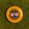 Metal pin badge featuring Lord Jagannath. Hand-crafted and available in multiple sizes.