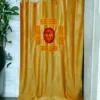 Silk door hanging featuring the image of Lord Jagannath and sacred symbols, adding a touch of devotion to your home.