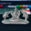 Silver Mahalaxmi Murti, handcrafted with intricate details, depicting the goddess of wealth and prosperity.