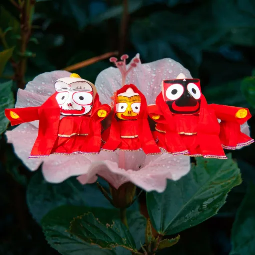 Sunday Dress for Jagannath, Balabhadra & Subhadra. Traditional red cotton attire for deities, replicating the garments worn in the Shri Mandir on Sundays.