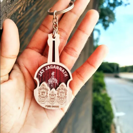 Shri Jagannath Mahaprabhu's Wooden Key Chain. Wooden keychain featuring Lord Jagannath, bringing blessings and divine presence.