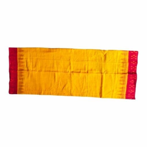 Shri Jagannath Mahaprabhu adorned with the vibrant yellow and red cotton cloth.