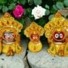 Golden Suna Besha attire for Lord Jagannath, Balabhadra, and Subhadra. Symbolizes divine opulence during Ratha Yatra.